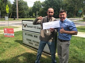 Neil LeValley with current Sunset Hill principal Jeremy Philipp.  