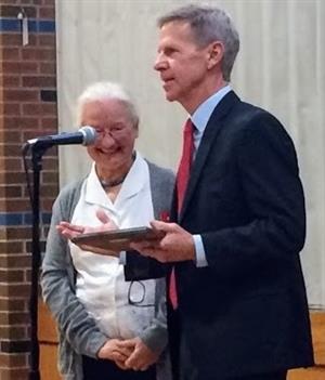 Scott Morgan presents an award 
